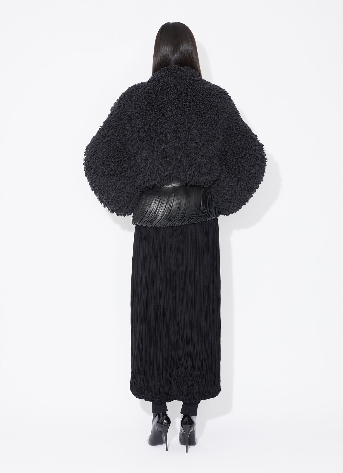 KNITTED FRINGE ROUND PANTS ALAÏA BLACK KNITTED FRINGE ROUND PANTS